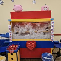 Bin with the fluffs and the hearts for the stuffed animals.