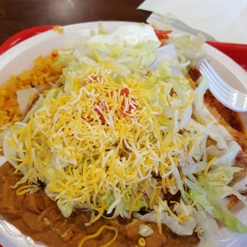 Oscar's Taco Shop - The #4 combo. A toastada and an enchilada (beef or chicken) with rice and beans. Includes a drink. With tax comes to $9.50. Very filling! - Mexican Near Me - Franklin, Tennessee Oscar's Taco Shop - The #4 combo. A toastada and an enchilada (beef or chicken) with rice and beans. Includes a drink. With tax comes to $9.50. Very filling! - Mexican Near Me - Franklin, Tennessee