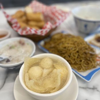Sam's Congee Delight - a bowl of soup and a bowl of noodles - Chinese Near Me - Markham, Ontario