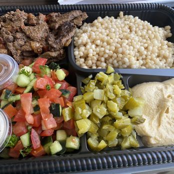 SAJJ Mediterranean - Steak Platter with Cous Cous, Hummus, Chopped Pickles & Tomato & Cucumber Salad - Mediterranean Near Me - San Bruno, California SAJJ Mediterranean - Steak Platter with Cous Cous, Hummus, Chopped Pickles & Tomato & Cucumber Salad - Mediterranean Near Me - San Bruno, California