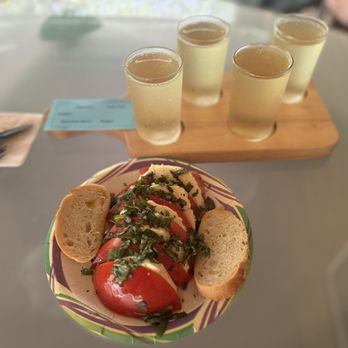 Barn Door Ciderworks - Cider flight and caprese salad. - Cideries Near Me - Fletcher, North Carolina