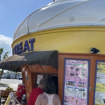 Twistee Treat - a woman and a man standing in front of an ice cream cone - Ice Cream & Frozen Yogurt Near Me - St. Pete Beach, Florida Twistee Treat - a woman and a man standing in front of an ice cream cone - Ice Cream & Frozen Yogurt Near Me - St. Pete Beach, Florida