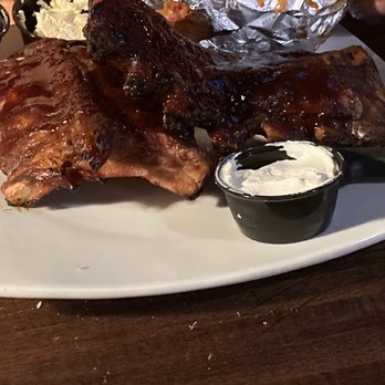 Salvino's - Full rack of ribs with a baked potato - Italian Near Me - Plainwell, Michigan