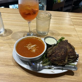 Five Loaves Cafe - Cup of Tomato Tarragon with crab soup and 1/2 Eggplant Fritters salad - American Near Me - Mt Pleasant, South Carolina Five Loaves Cafe - Cup of Tomato Tarragon with crab soup and 1/2 Eggplant Fritters salad - American Near Me - Mt Pleasant, South Carolina