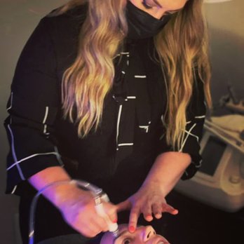 Skin Solutions by Jess - Jess performing a diamond glow treatment - Skin Care Near Me - Worthington , Ohio Skin Solutions by Jess - Jess performing a diamond glow treatment - Skin Care Near Me - Worthington , Ohio