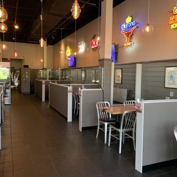 Hi Wings - New dining room setup. Barrier between booths and hand sanitizer for each one as well. Standing barrier even for the staff. - Chicken Wings Near Me - Austin, Texas Hi Wings - New dining room setup. Barrier between booths and hand sanitizer for each one as well. Standing barrier even for the staff. - Chicken Wings Near Me - Austin, Texas