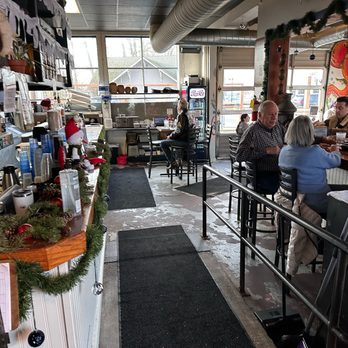 Andy's Fish House - The bar and kitchen on the left as you walk into the dining room - New American Near Me - Snohomish, Washington Andy's Fish House - The bar and kitchen on the left as you walk into the dining room - New American Near Me - Snohomish, Washington
