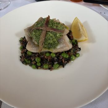 Zimmi's - Zimmi's - Black Cod over wild rice and peas. Anchovies mark the spot to start eating! - American Near Me - New York, New York Zimmi's - Zimmi's - Black Cod over wild rice and peas. Anchovies mark the spot to start eating! - American Near Me - New York, New York