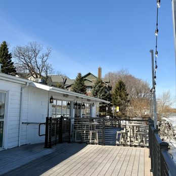 Lola's Lakehouse - Patio just waiting for tables and umbrellas - American Near Me - Waconia, Minnesota Lola's Lakehouse - Patio just waiting for tables and umbrellas - American Near Me - Waconia, Minnesota