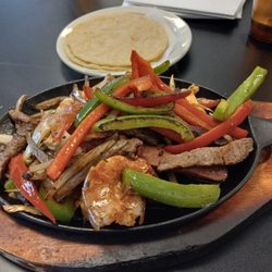 El Limeno Restaurant - El Limeno Plate (17.99) Beef, Chicken, Shrimp, Sausage. Rice, Beans. Salad with Ranch. Avocado slices. 2 homemade tortillas