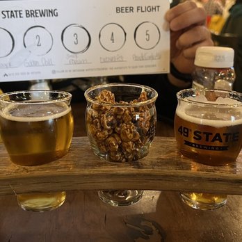 49th State Brewing - Denali - Beer flight and popcorn - Breweries Near Me - Healy, Alaska