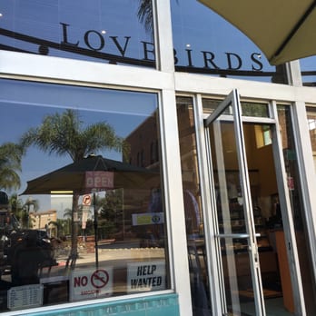 Lovebirds Cafe - Reflection of sign on outside window - Juice Bars & Smoothies Near Me - Alhambra, California