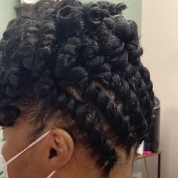 Mid back photo of hair by Lakena at Beauty Experience.