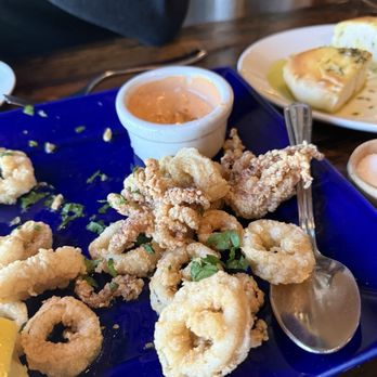 MiNGO - The lightest crisp semolina breaded calamari! All rings and crunchy tentacles paired with creamy chili aioli - Italian Near Me - Beaverton, Oregon MiNGO - The lightest crisp semolina breaded calamari! All rings and crunchy tentacles paired with creamy chili aioli - Italian Near Me - Beaverton, Oregon