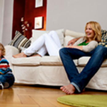Kacey's Carpet & Tile - a family sitting on a couch - Carpet Installation Near Me - North Versailles, Pennsylvania Kacey's Carpet & Tile - a family sitting on a couch - Carpet Installation Near Me - North Versailles, Pennsylvania