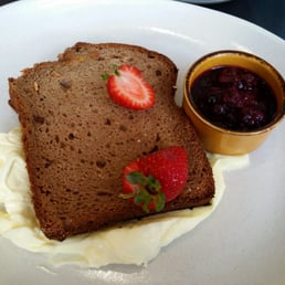 Banana bread served with berry compote and mascapone cream Banana bread served with berry compote and mascapone cream