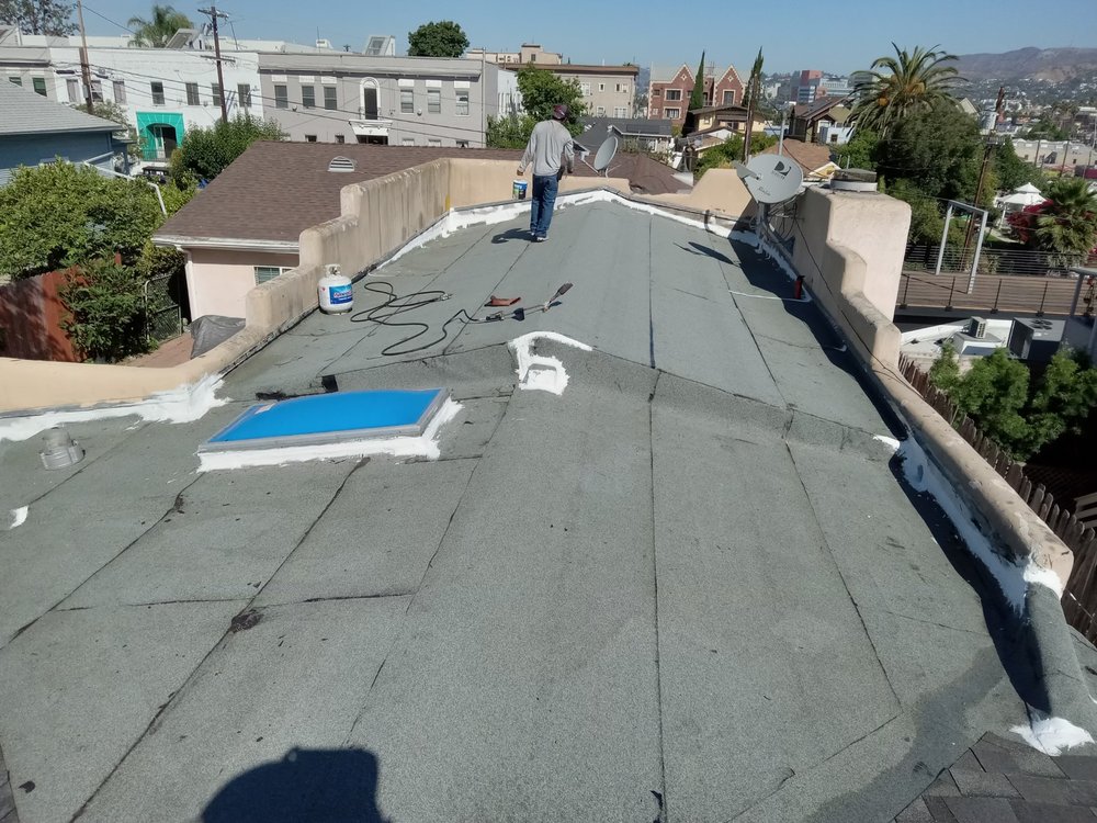 Slide of Ronald's Roofing