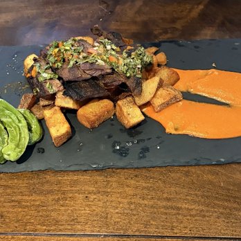 Bolero Restaurante - Skirt Steak (N) $ 36 Chimichurri-marinated grilled 8oz beef, romesco sauce, patatas bravas, charred shishitos - Tapas/Small Plates Near Me - Temecula, California