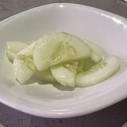 These sliced pickled cucumbers are placed on the table after you place your order. These sliced pickled cucumbers are placed on the table after you place your order.