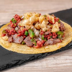 Tacos Don Manolito - Taco Costeño (mix of cecina, longaniza, onions, jalapeño peppers and crunchy chicharron)