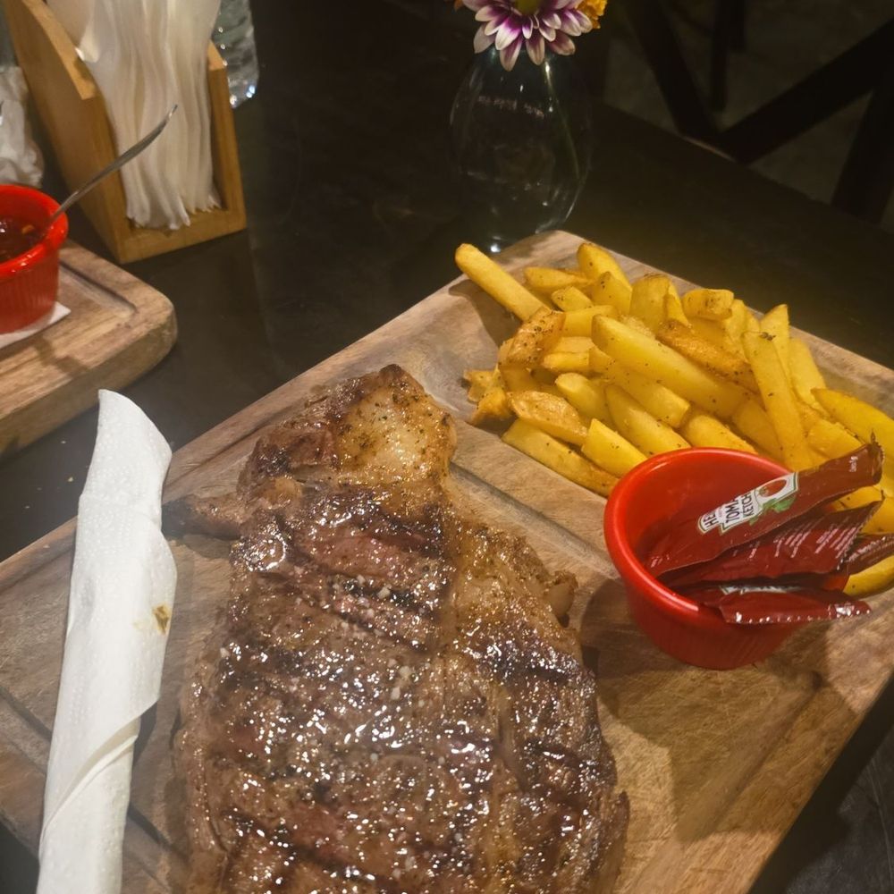 Barrio de Tango - Rib eye with fries. - Argentine Near Me - San José del Cabo, BCS Barrio de Tango - Rib eye with fries. - Argentine Near Me - San José del Cabo, BCS