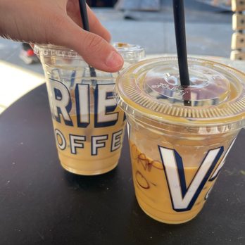 Variety - Left is how we got the coffee (1/2 empty) , right is with added milk - Coffee & Tea Near Me - Brooklyn, New York