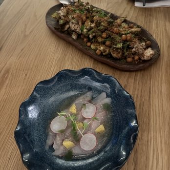 Torafuku - kanpachi crudo and brussel sprout salad, both items were on their happy hour menu, the kanpachi crudo is part of the 7 course omakase menu - Asian Fusion Near Me - Vancouver, British Columbia