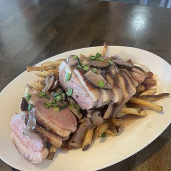 Stumbletown - Duck with mushroom sauce - Cocktail Bars Near Me - Seattle, Washington Stumbletown - Duck with mushroom sauce - Cocktail Bars Near Me - Seattle, Washington