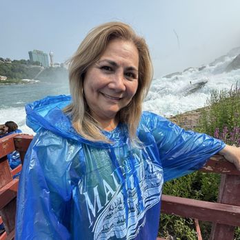 Over the Falls Tours - Sandra enjoying the tour and exploring the Falls - Tours Near Me - Niagara Falls, New York