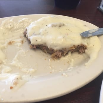 Doc's Diner - Country fried steak with sausage gravy (excuse the big bites, I couldn't wait to try it) - Seafood Near Me - Key Largo, Florida