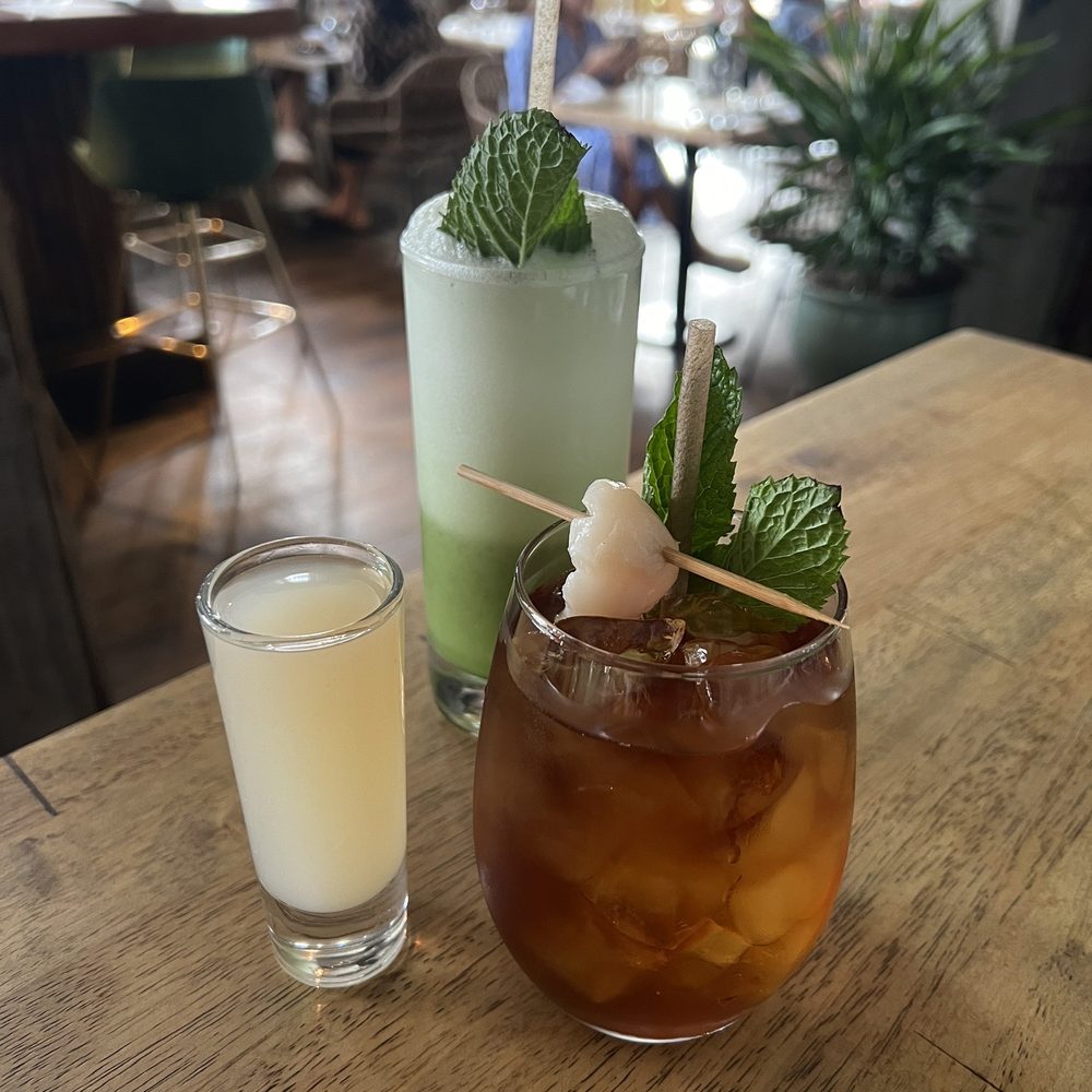 Phuc Yea - oolong tea with lychee syrup on the side and jade goddess (gin fizz) - Vietnamese Near Me - Miami, Florida Phuc Yea - oolong tea with lychee syrup on the side and jade goddess (gin fizz) - Vietnamese Near Me - Miami, Florida