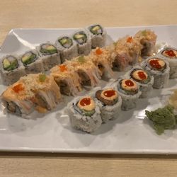 Itzmi Japanese Restaurant - California roll, Itzmi spicy roll and salmon spicy roll all accompanied by Mizo soup and a salad.