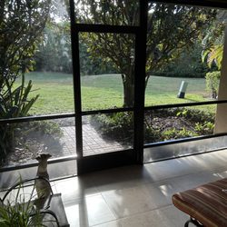 Phil Screens - Patio rescreen, bottom with Florida Screen.