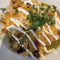 The Texas Cafe - Chilaquiles Presentation was pretty, but had no taste. You couldn't barely find the scrambled eggs & drenched in way too much salsa.