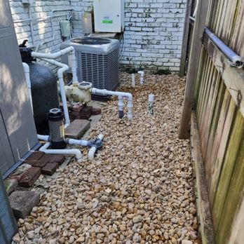Zion Lawn & Landscape - Rock installation around the AC unit and pool pump to keep the area dry, and clean. - Lawn Services Near Me - Baton Rouge, Louisiana Zion Lawn & Landscape - Rock installation around the AC unit and pool pump to keep the area dry, and clean. - Lawn Services Near Me - Baton Rouge, Louisiana
