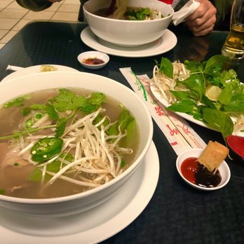 Pho Can Tho By 1 - Large size Pho- beef rice noodle soup with rare steak 1 eggroll - Vietnamese Near Me - Tucson, Arizona Pho Can Tho By 1 - Large size Pho- beef rice noodle soup with rare steak 1 eggroll - Vietnamese Near Me - Tucson, Arizona