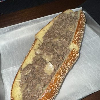 Benny's - Cheesesteak with cooper sharp, fried onions, on a seeded roll. - Sandwiches Near Me - Philadelphia, Pennsylvania