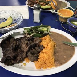 La Poblanita - Carne asada with rice, beans, and whole jalapeños. Steak is so flavorful and tender.