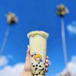 Happy Lemon - Mango Matcha Smoothie with boba.