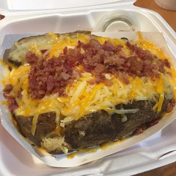 Brannan Schlitz BBQ - The full photo of the huge brisket stuffed potato. Enough for two to share or one really hearty meal! - Barbeque Near Me - Sanford, North Carolina