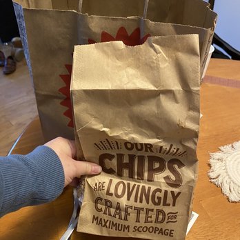 Chipotle Mexican Grill - Less than half the actual bag of chips (below my thumb) and it was mainly broken chips that were so cold and soggy - Mexican Near Me - Mt Pleasant, South Carolina