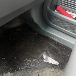 The puddle of water thst accumulated after ONE DAY of rain due to a leak in the windshield. (Car was bought before rainy season) The puddle of water thst accumulated after ONE DAY of rain due to a leak in the windshield. (Car was bought before rainy season)