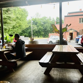 Melzingah Tap House - Grab A Bench: (Looking Towards Restaurant) - Beer Bar Near Me - Beacon, New York Melzingah Tap House - Grab A Bench: (Looking Towards Restaurant) - Beer Bar Near Me - Beacon, New York