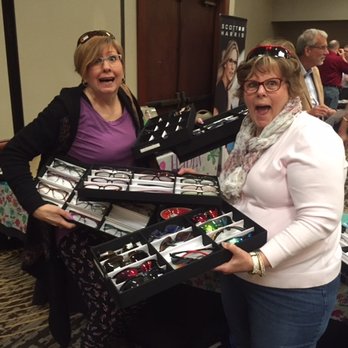 Full Circle Vision Care - Shawn and Sheri checking out new frames and getting educated on new technology in the optical world! - Optometrists Near Me - Midland, Michigan