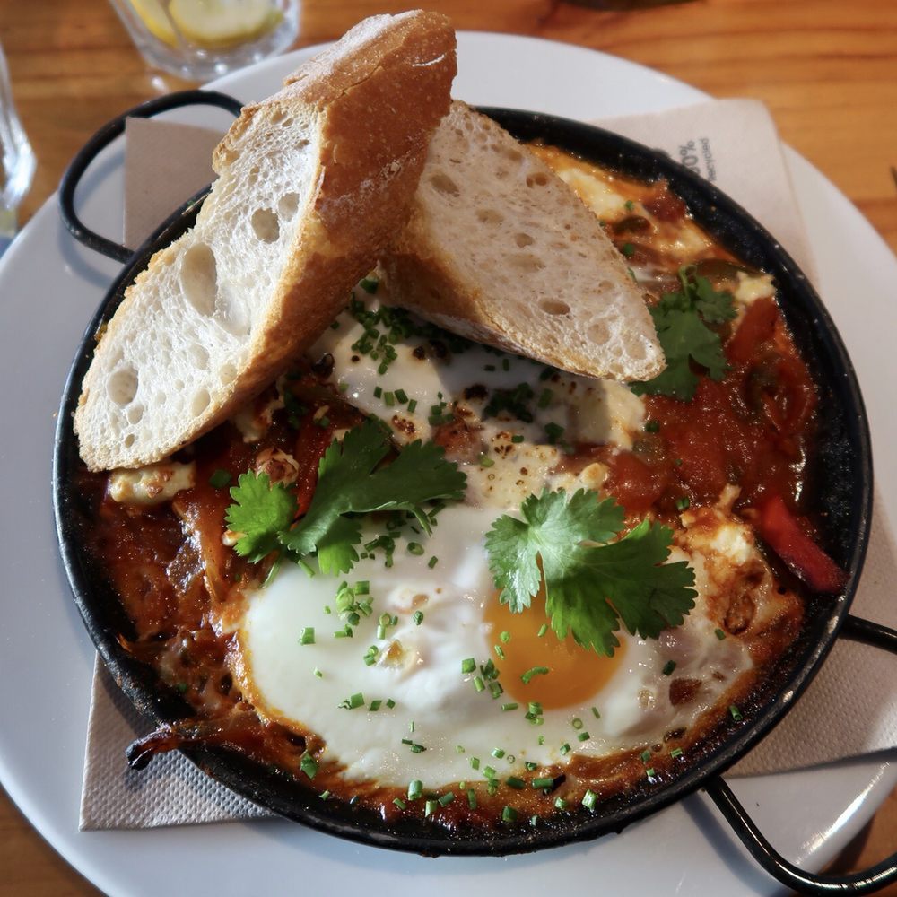 Firebug - The Shakshuka Dish: "a Tunisian inspired dish of baked eggs in a tomato, peppers, and onion sauce..." - Tapas Bars Near Me - Barcelona, B