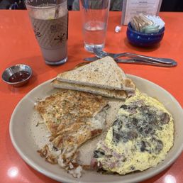 My breakfast is my favorite. Omelet Hash Browns and Toast!