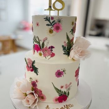 A2 Bakeshoppe - a white cake with pink flowers on it - Custom Cakes Near Me A2 Bakeshoppe - a white cake with pink flowers on it - Custom Cakes Near Me