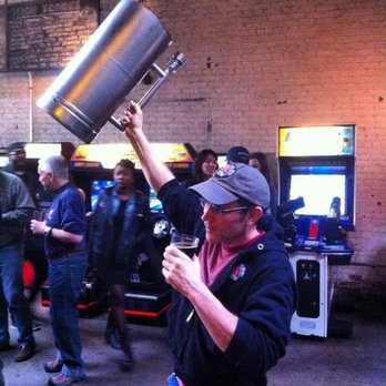 Bridge and Tunnel Brewery - Owner Rich hoisting the Ruppert Cup. B&T is the winner of the Ruppert Cup from the 2017 NYC Craft Brew Week as chosen by the people of NYC! - Breweries Near Me - Ridgewood, New York