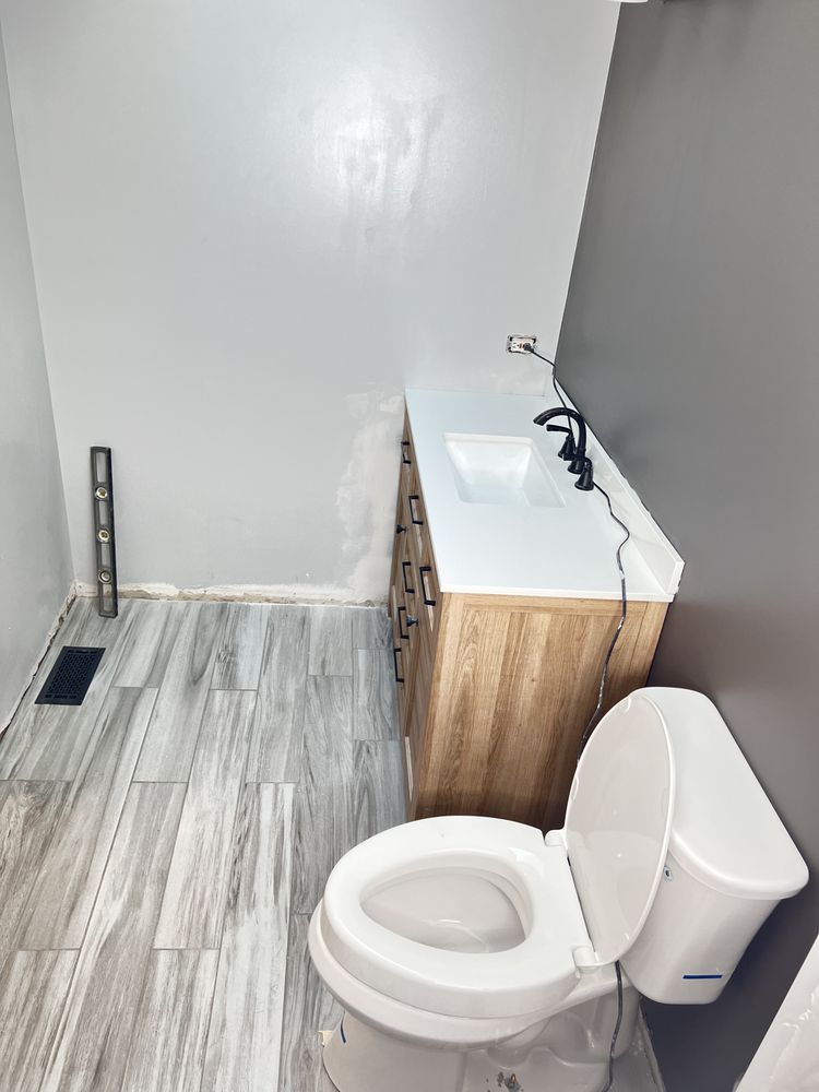 Slide of D&D plumbing and Remodeling
