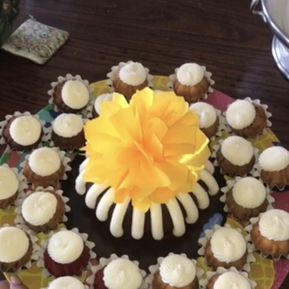 Nothing Bundt Cakes - custom assortment of bundtinis with an 8inch chocolate chocolate chip cake with a golden yellow bow - Bakeries Near Me - Shrewsbury, New Jersey Nothing Bundt Cakes - custom assortment of bundtinis with an 8inch chocolate chocolate chip cake with a golden yellow bow - Bakeries Near Me - Shrewsbury, New Jersey
